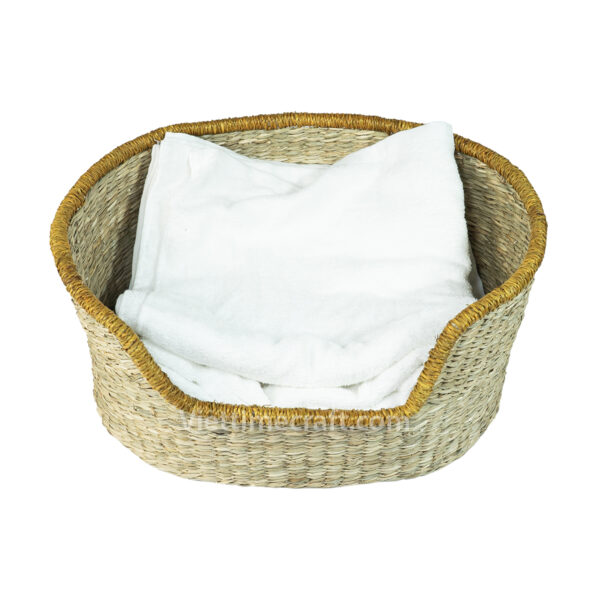 seagrass pet basket bed with a pillow