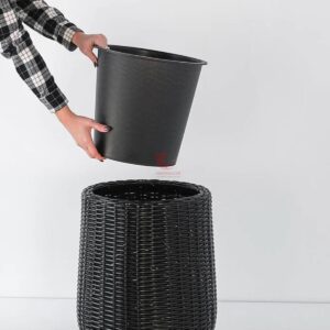 Decorative PE rattan planter showcasing healthy greenery on a balcony